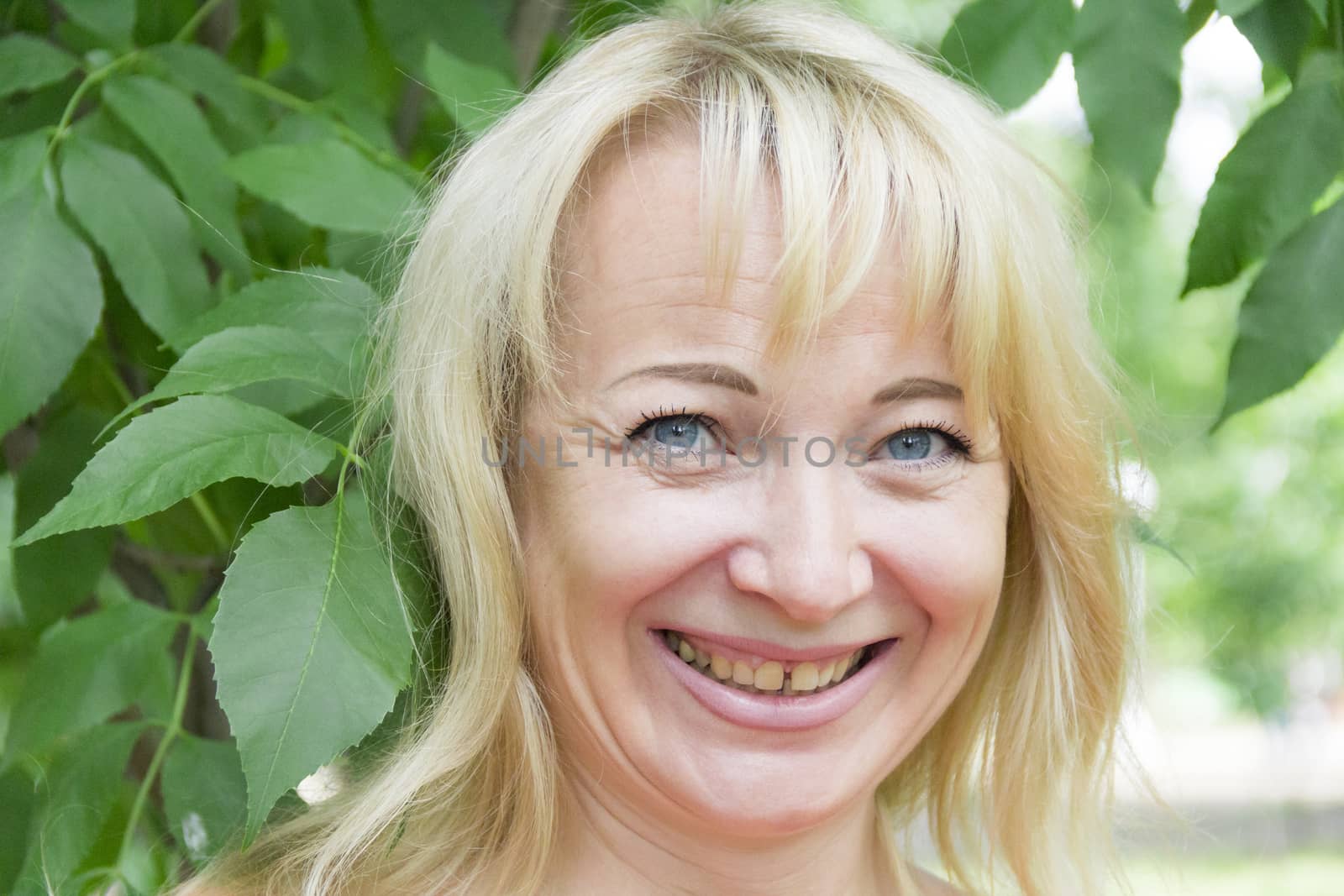 European blonde with long hair and blue eyes