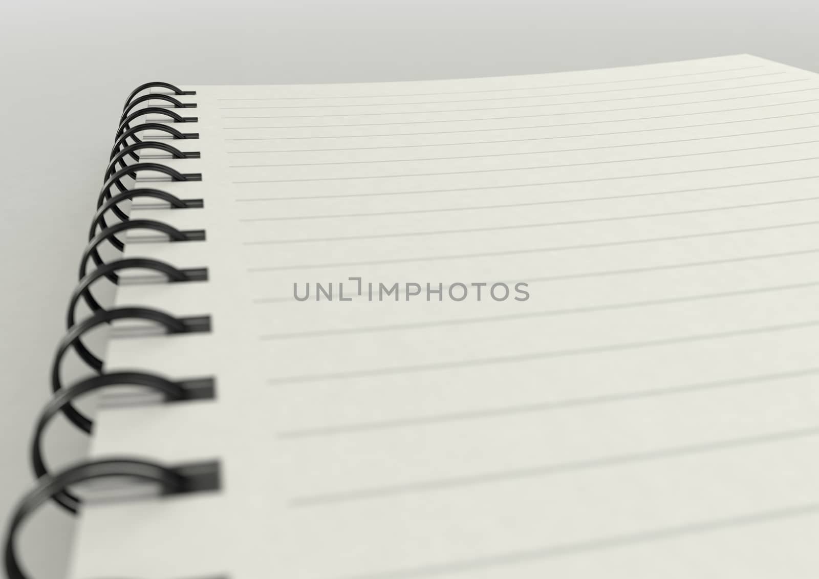 a  blank lined note pad on a plain surface close up