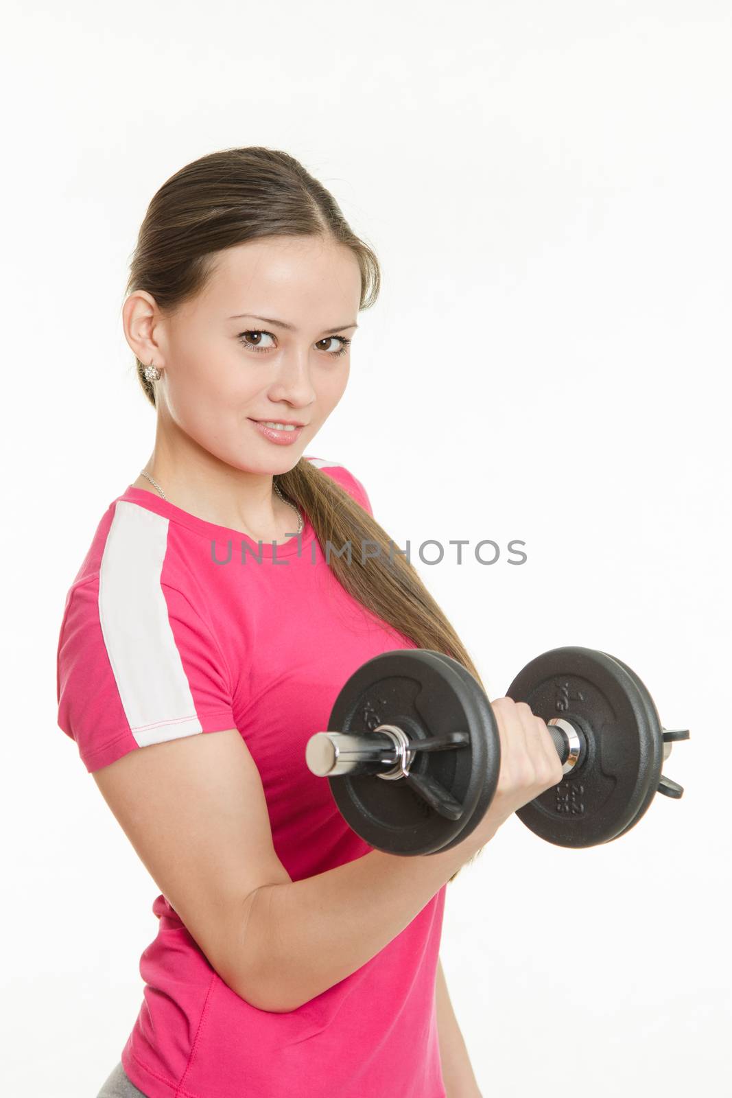 Young beautiful girl athlete Europeans conducting physical training