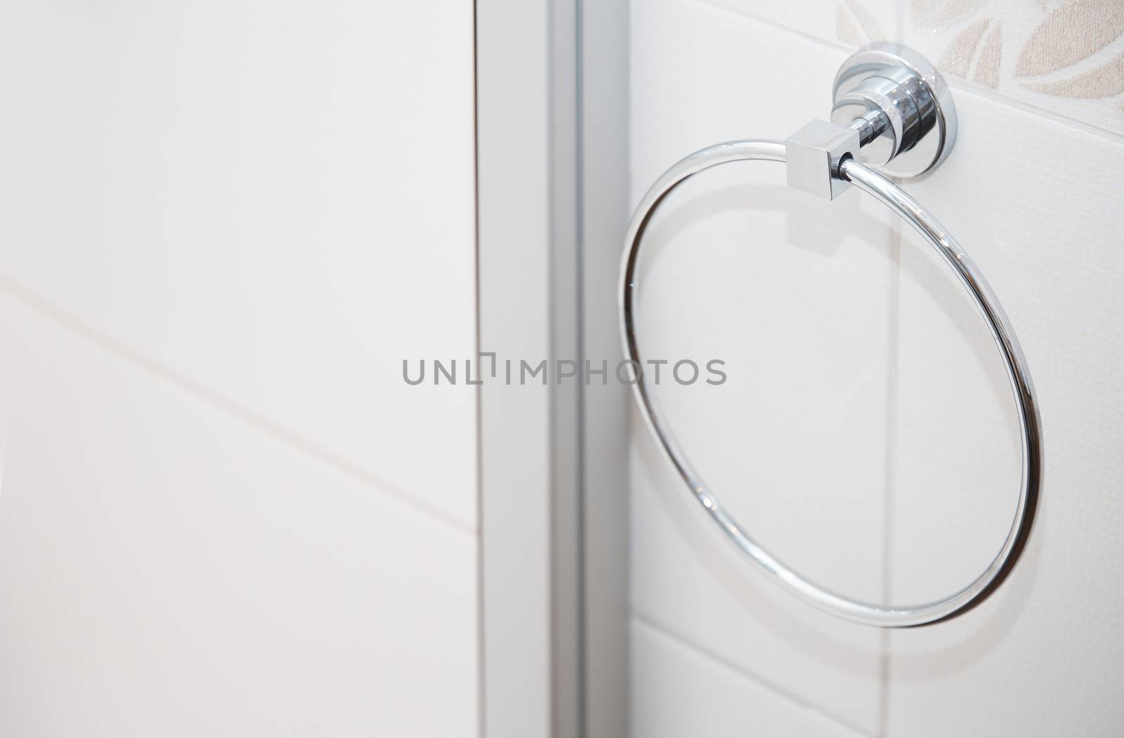 Towel holder in bathroom. Close-up horizontal photo