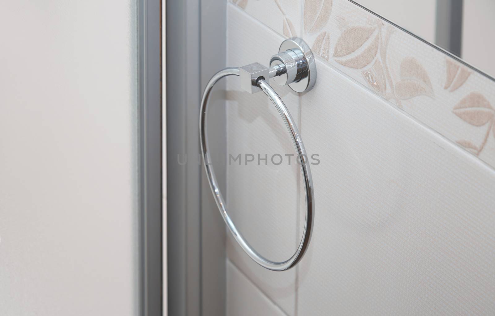 Towel holder in bathroom. Close-up horizontal photo