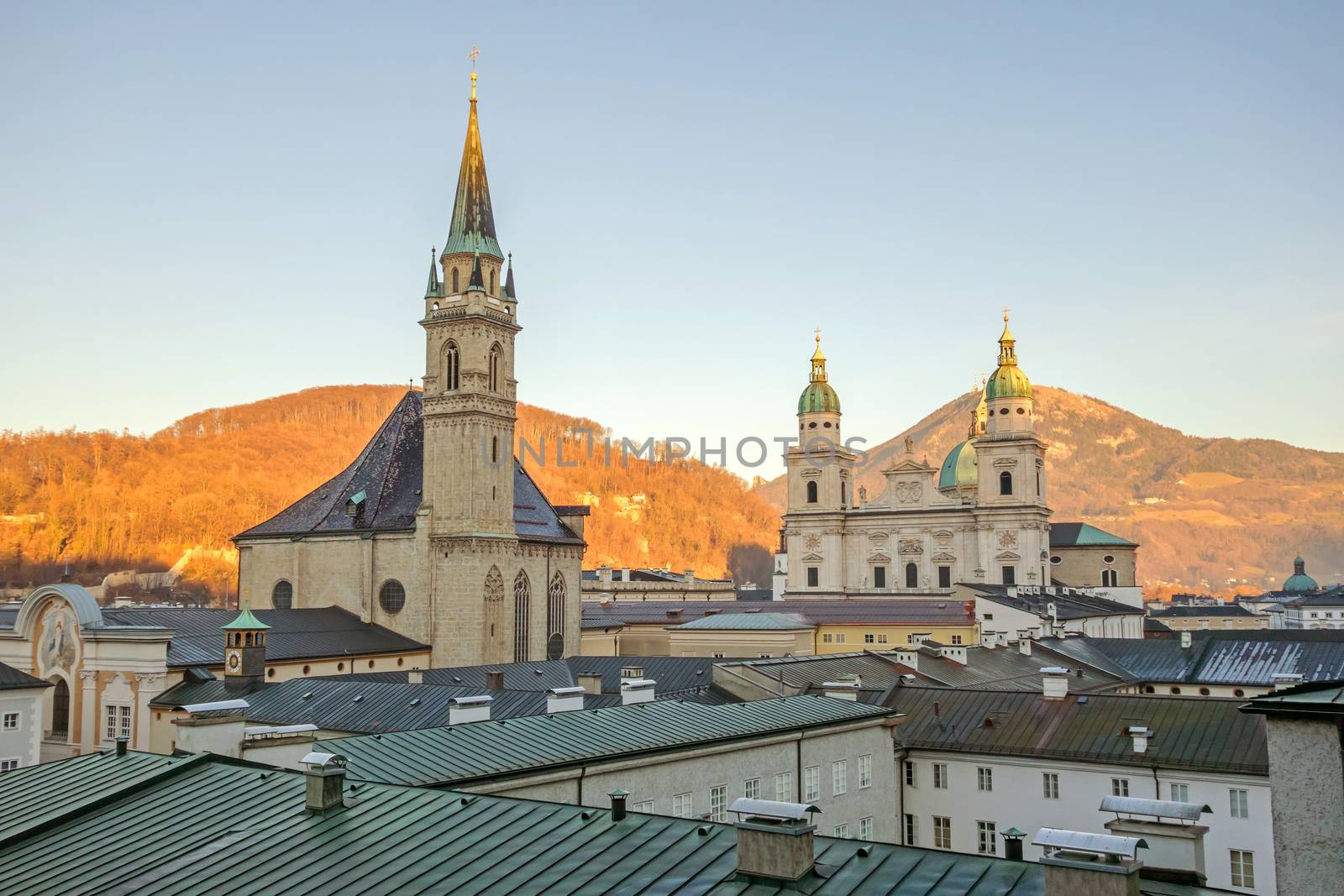 Old town of Salzburg dominated by old church buildings with tall towers and domes, Austria