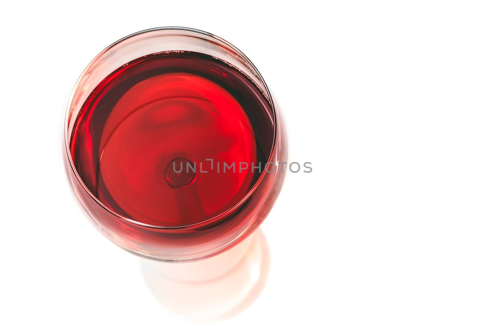 top of view of red wine in the glass isolated by donfiore