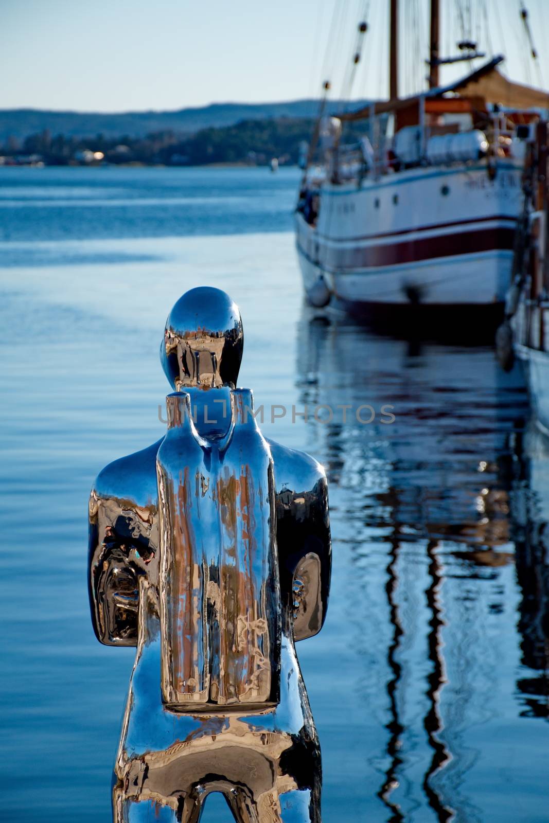 OSLO - MARCH 21: Contemporary scuplture of a diverr in Oslo harbour