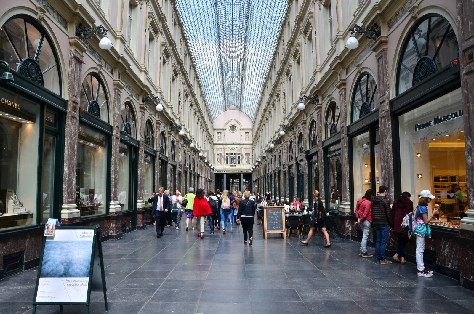 Brussels, Belgium - May 12, 2015: Tourists shopping at The Galeries Royales Saint-Hubert in Brussels by siraanamwong