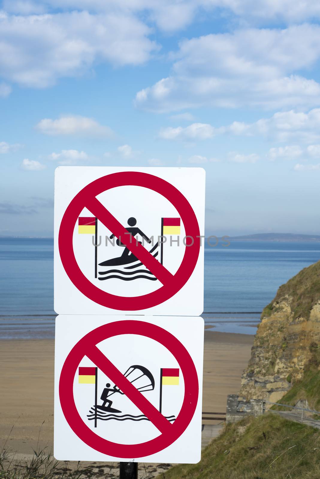 large warning signs for surfers in ballybunion by morrbyte