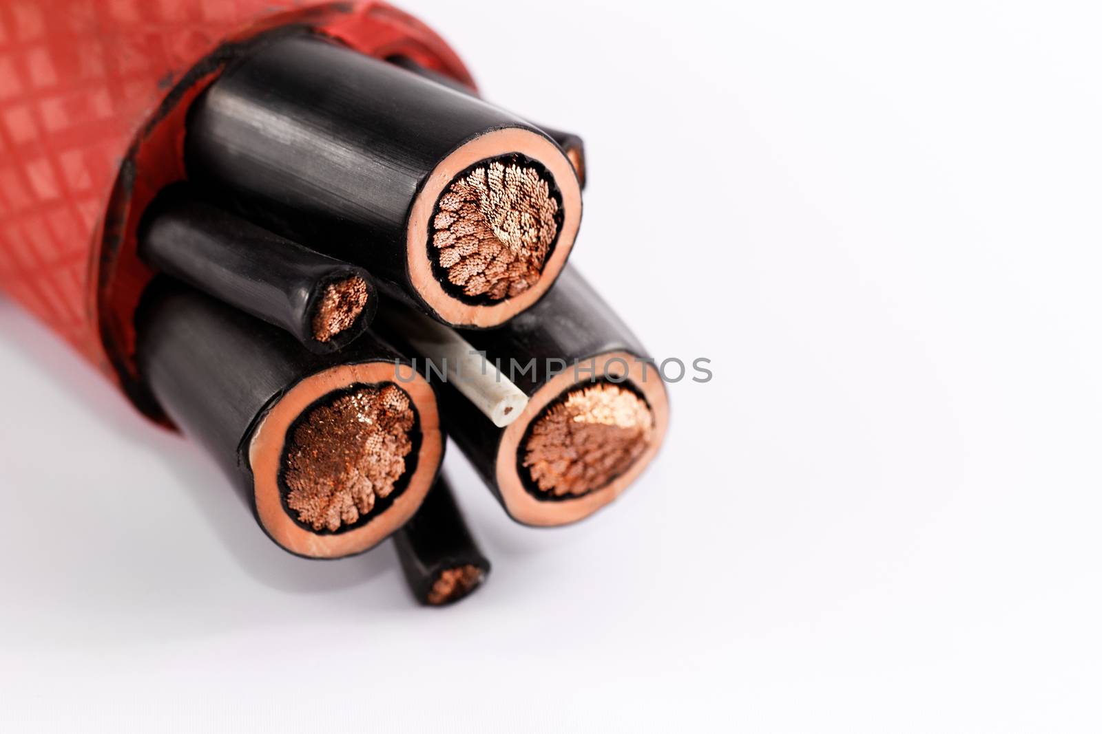 Close up photo of a high voltage cable isolated on white background
