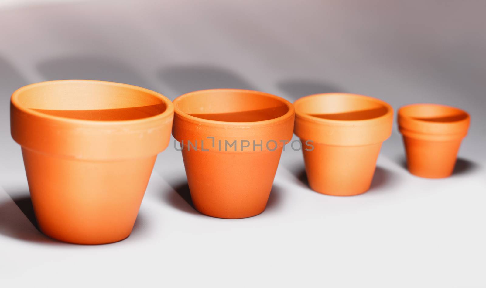 Photo of empty clay plant or flower pots