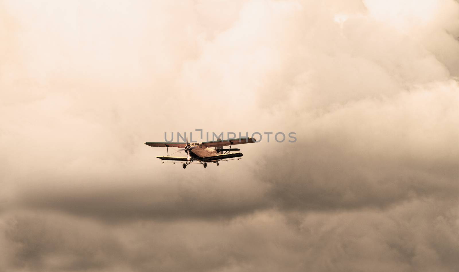 Photo of a plane on the cloudy sky