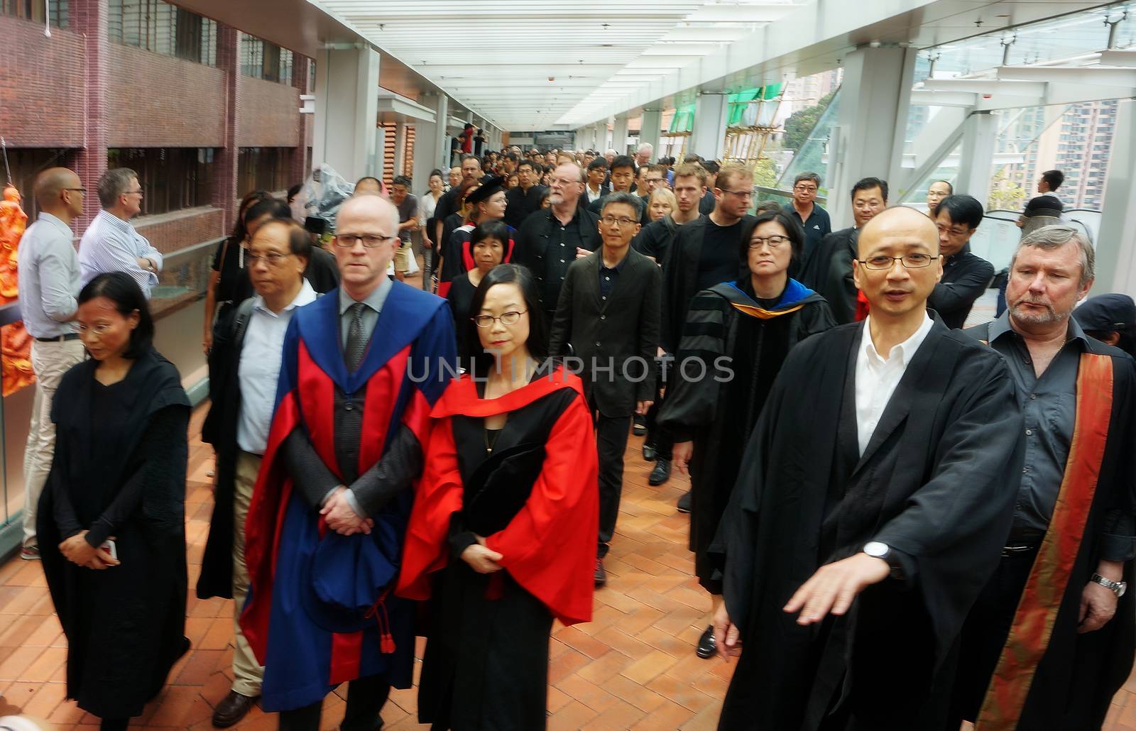 CHINA, Hong-Kong : Around 1 000 students, professors and academics dressed in black walk in silence in the University of Hong-Kong campus during a silent march against alleged Pekin interference in an academic nomination on October 6th, 2015. The university council rejected by an unclear vote the nomination of law dean Johannes Chan Man-num as pro-vice-chancellor. Johannes Chan Man-num is known to be close to a Hong-Kong Occupy movement leader. 