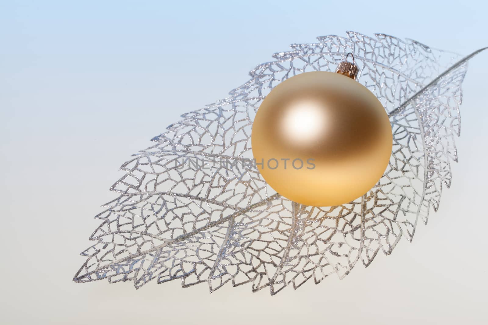 New Year background with golden glass toy by igor_stramyk