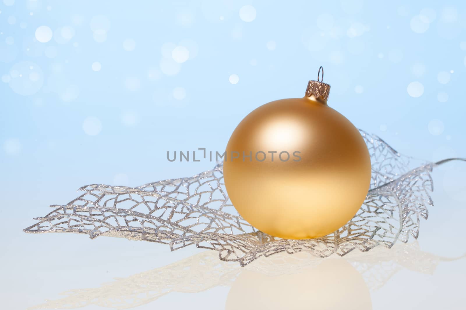 New Year background with golden glass toy by igor_stramyk