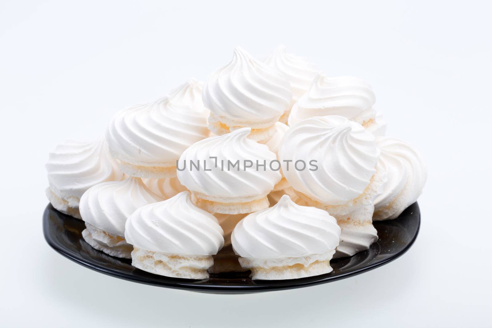 French vanilla meringue cookies on white background 