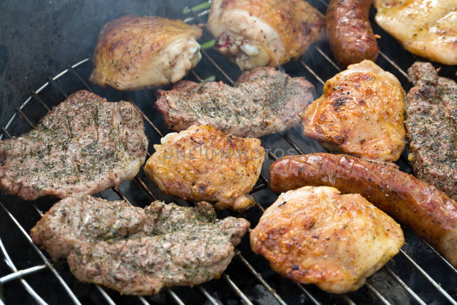 barbecue with delicious grilled meat on grill 