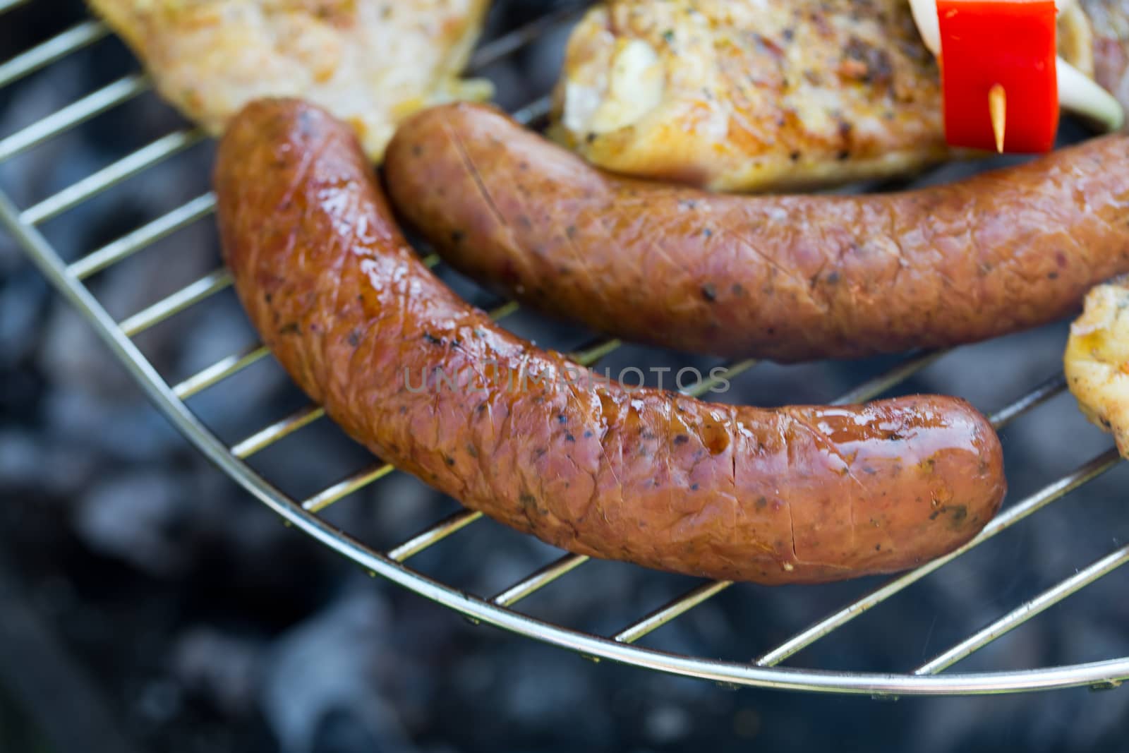 barbecue with delicious grilled meat on grill 