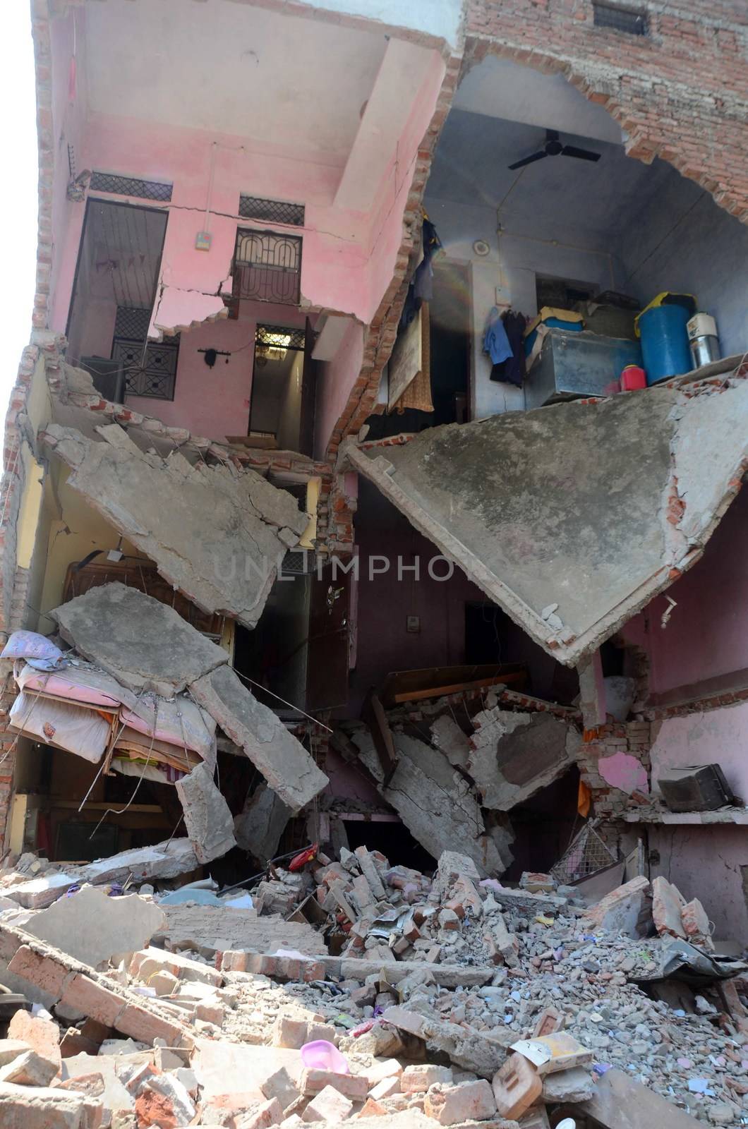 INDIA, Allahabad: A view of two houses which collapsed due to an explosive blast at a firecracker factory on October 6, 2015. According to our contributor on the ground, the firecracker factory was operating illegally.