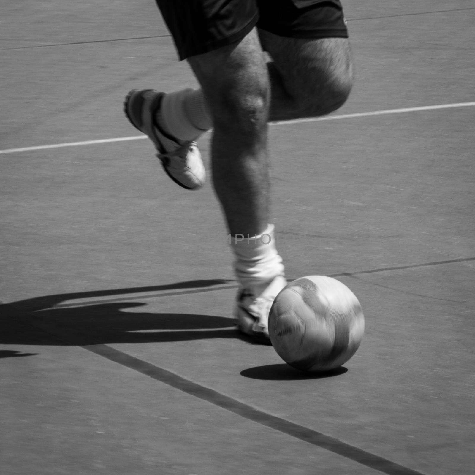 Soccer player running with the ball. by alanstix64