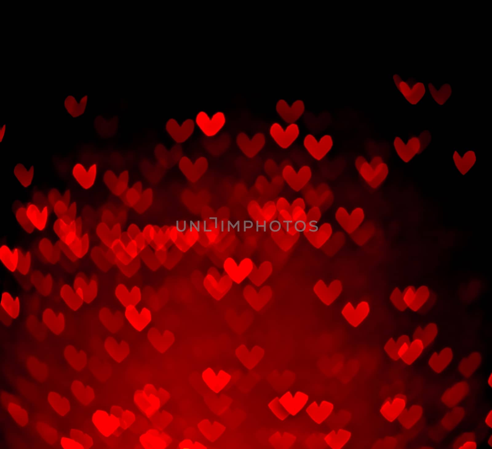 red hearts bokeh as background by donfiore