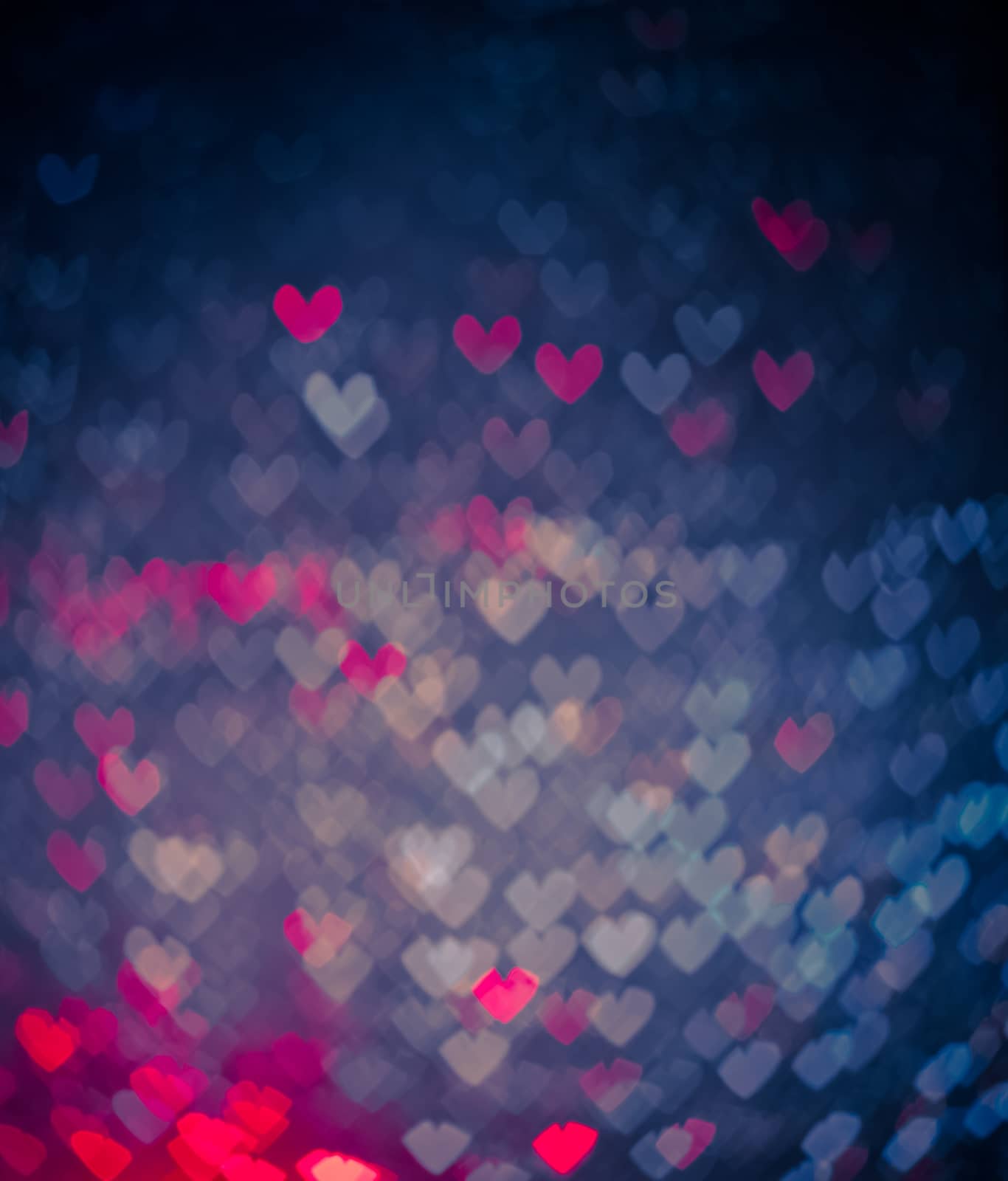 blue and pink hearts bokeh as background by donfiore