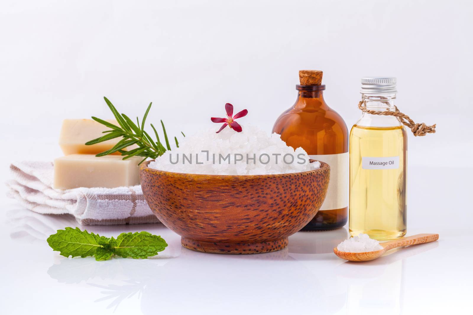 Sea salt natural spa ingredients ,herbs,soap and massage oils for scrub and skin care isolate on white background.