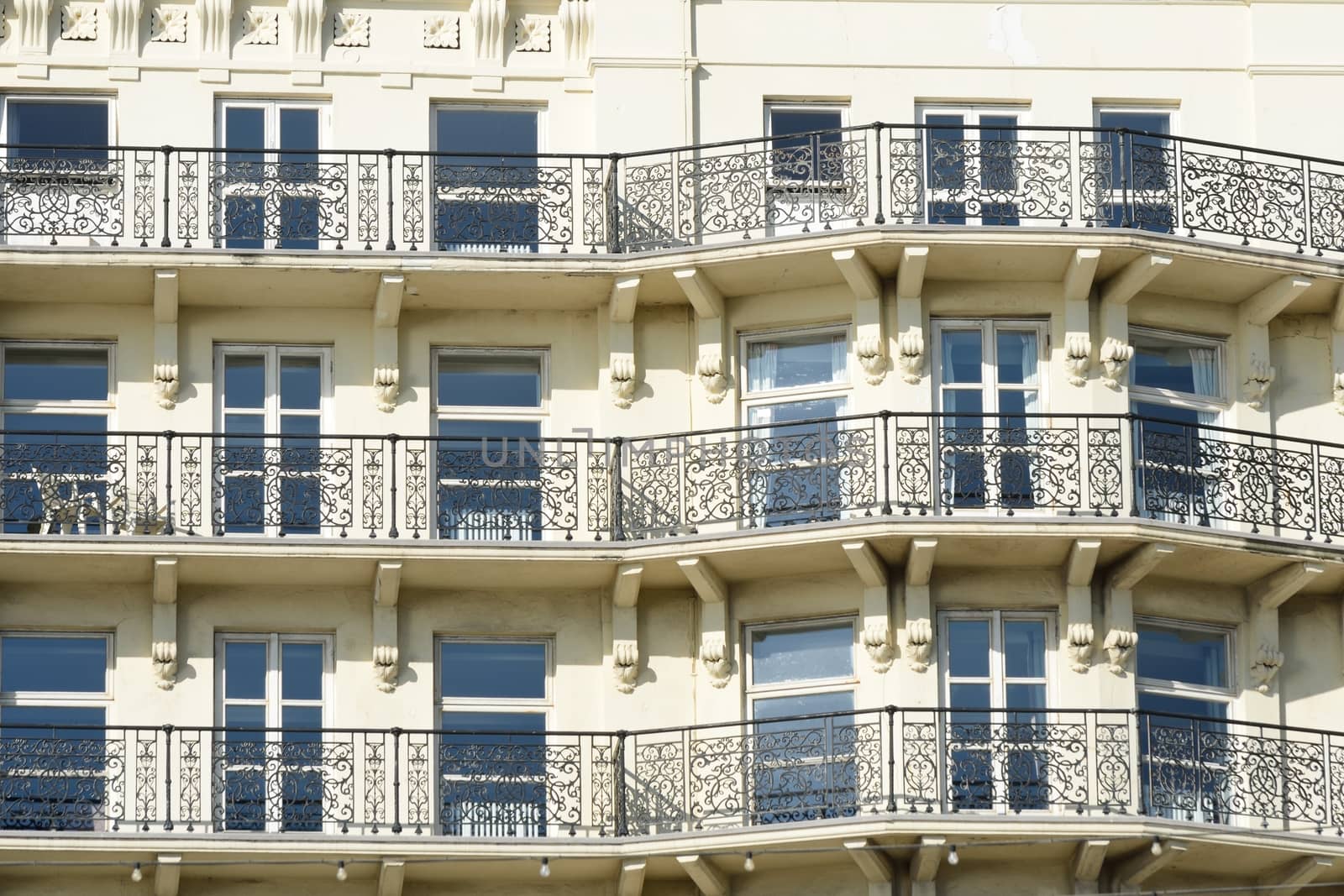 Frontage of luxury seaside hotel by pauws99