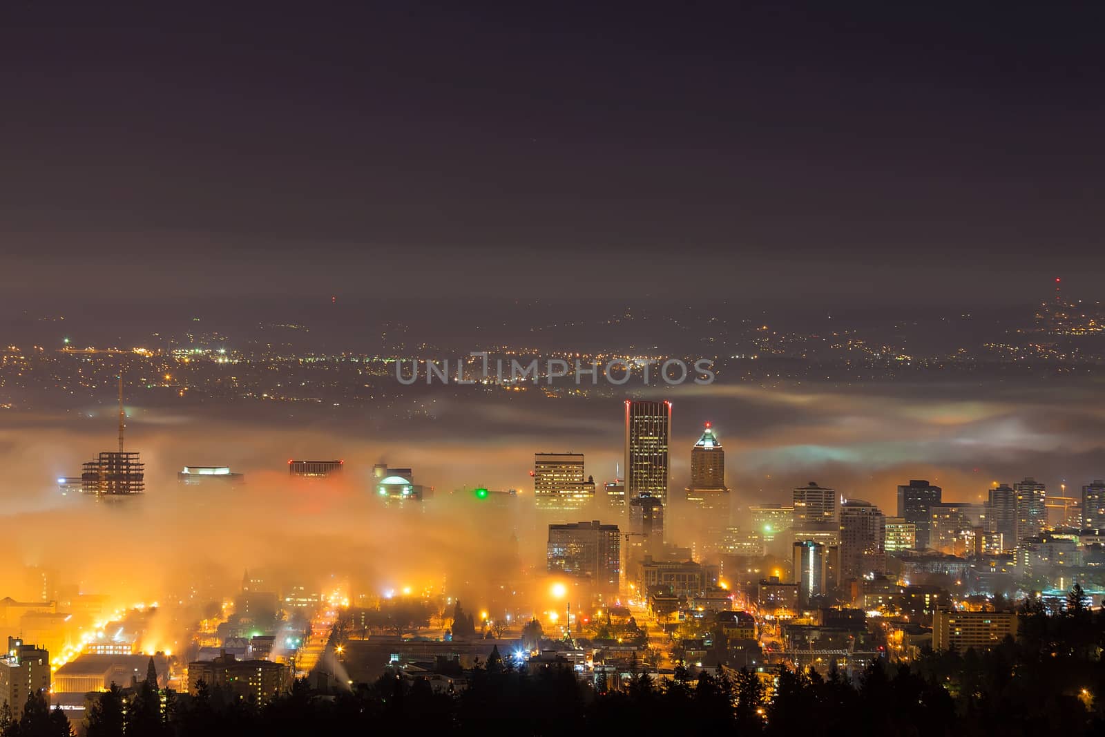 Portland Oregon downtown cityscape covered in Low Fog at Dawn