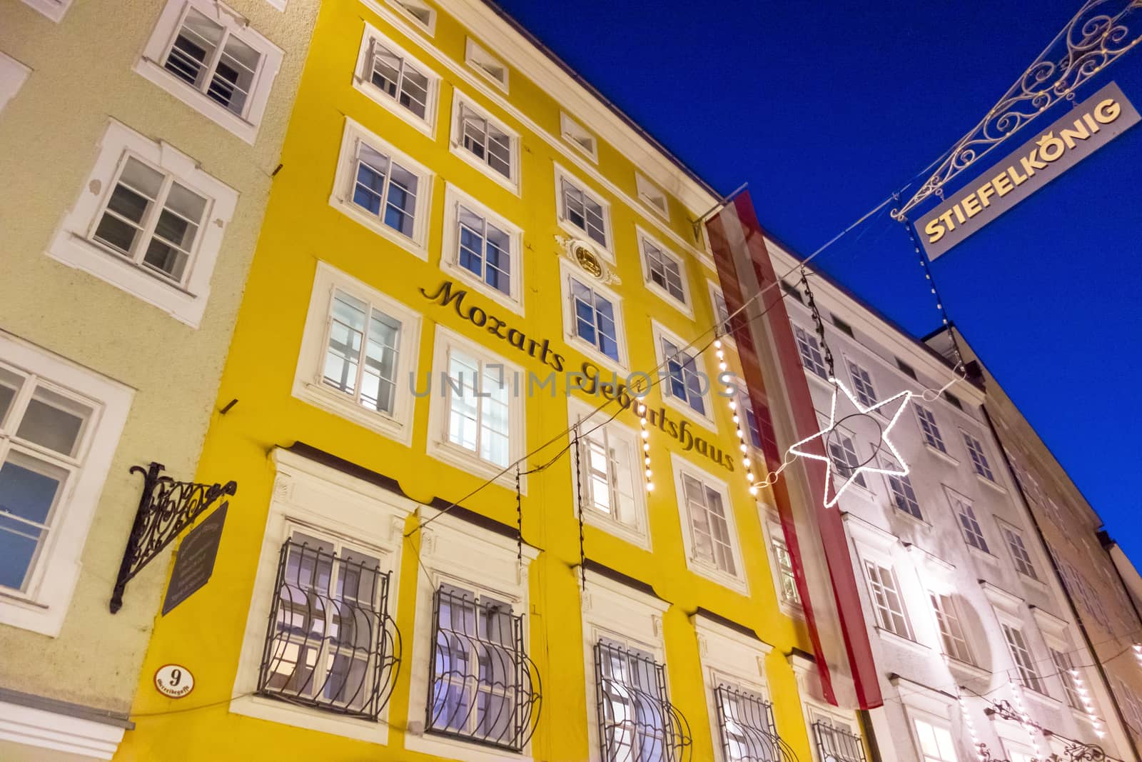 Salzburg, Austria - December 31, 2013: Birth house of Wolfgang Amadeus Mozart by night.