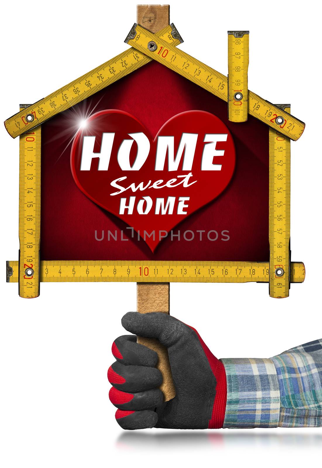 Hands with work glove holding a yellow wooden meter ruler in the shape of house with text Home sweet home. Isolated on white background