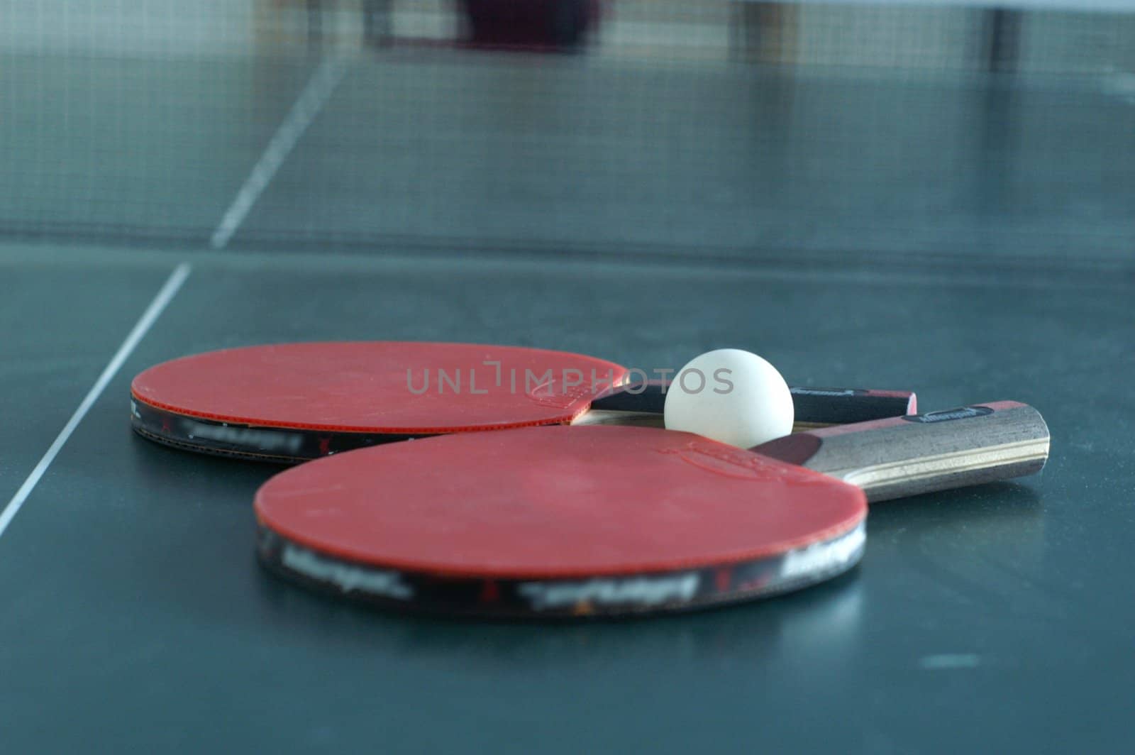 ping pong rackets on a table