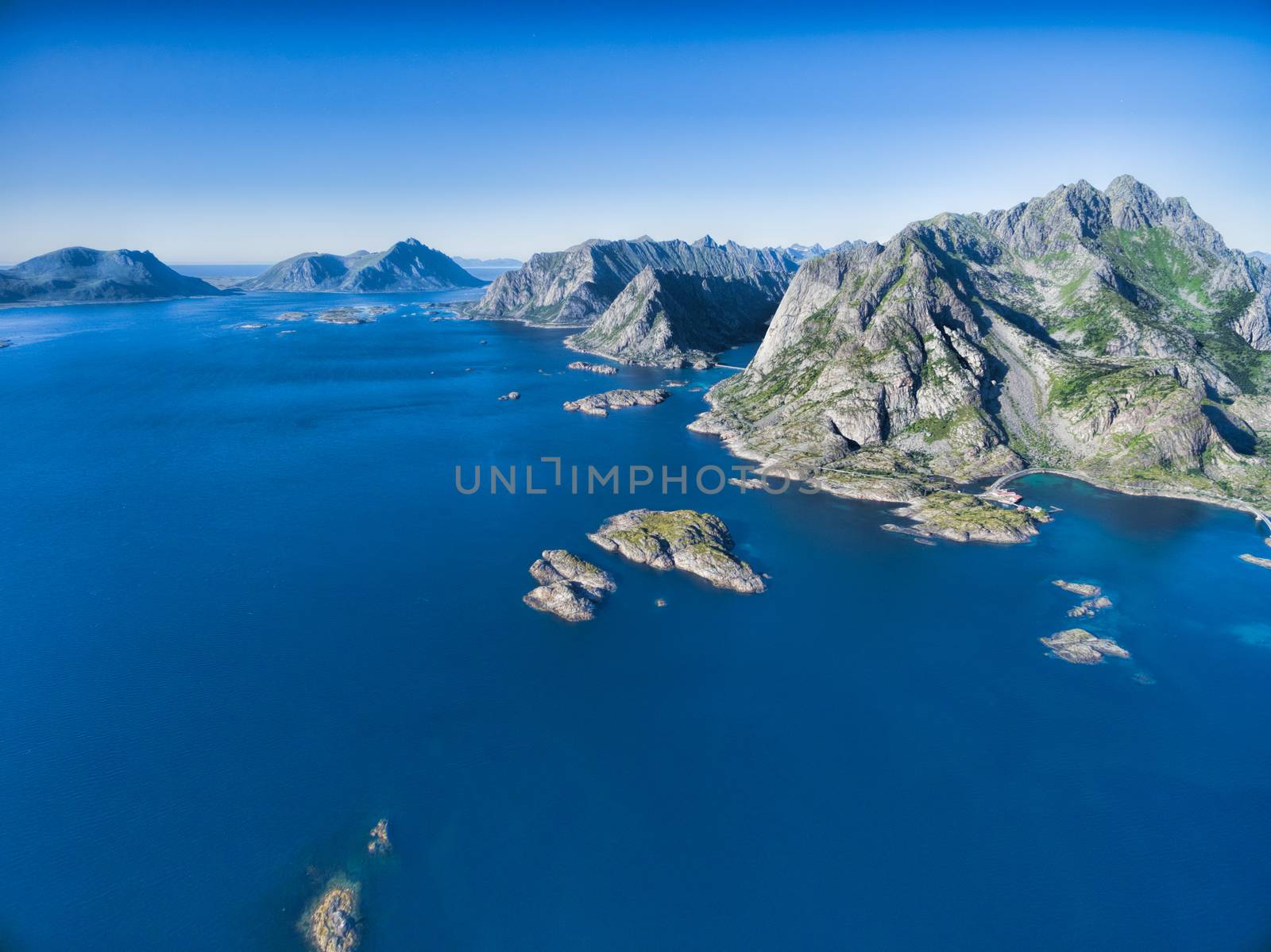 Aerial view of Lofoten coastline with its magnificent mountain peaks, Norway