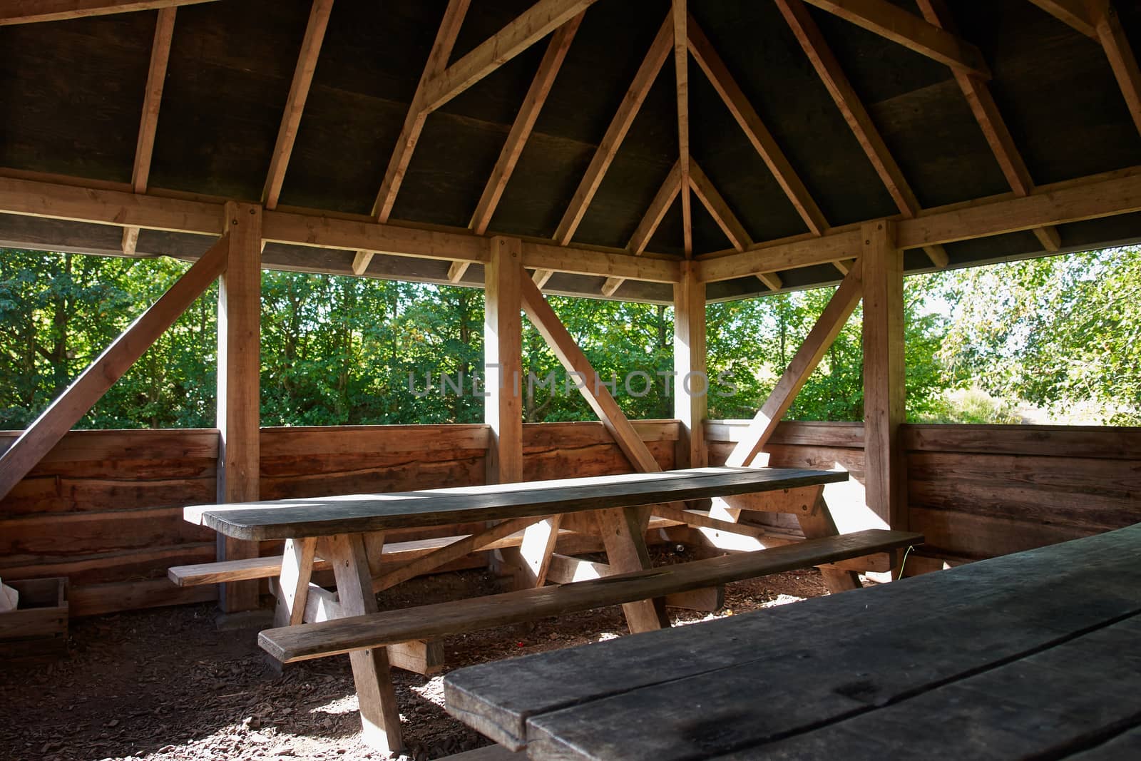 Rustic style Picnic Table made of wood in a camping site