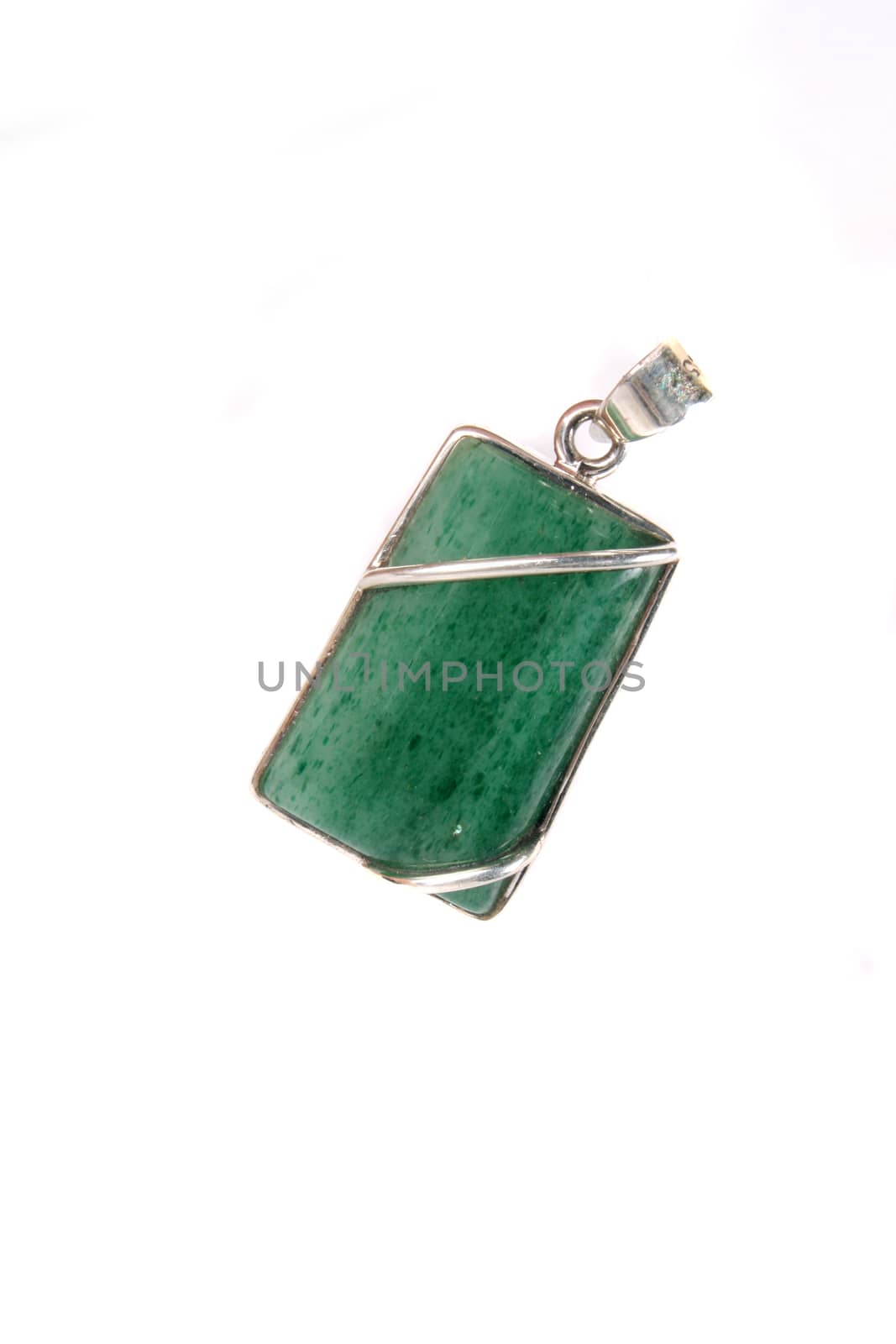 A silver pendant with a semi precious green gemstone, on white studio background.