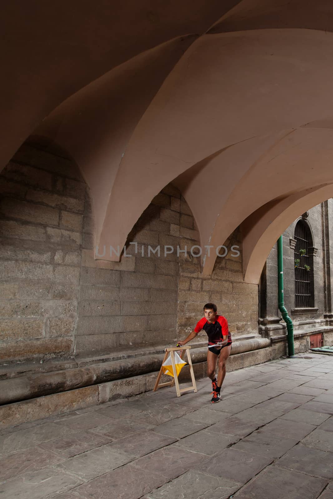 Man punching at control point participating by igor_stramyk