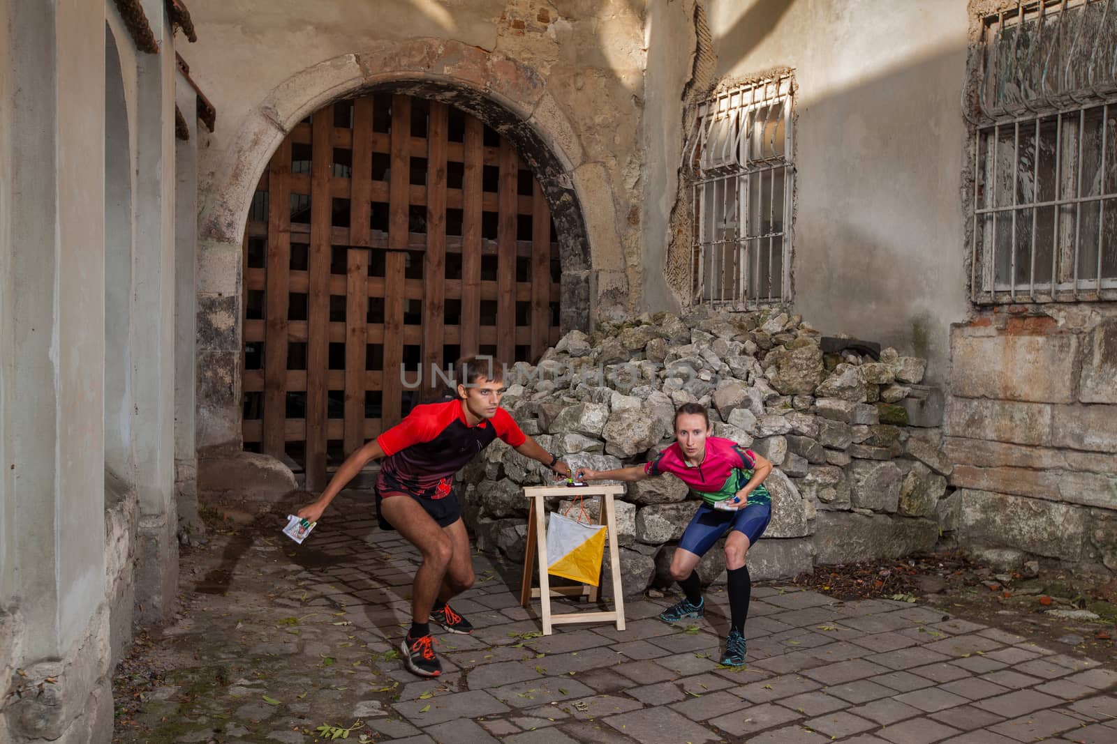 Woman and woman punching at control point by igor_stramyk