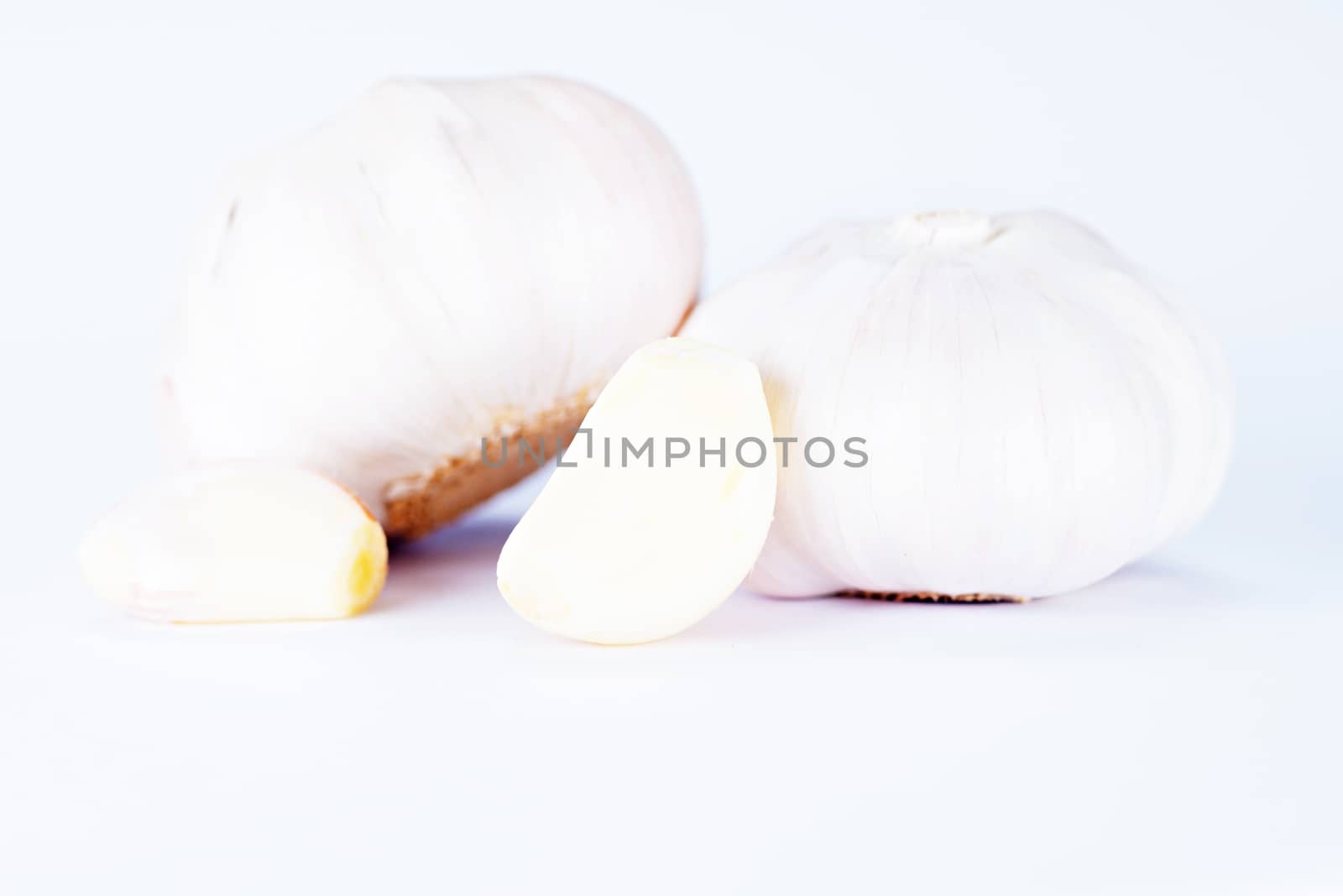 garlic isolated on white background by Yuri2012