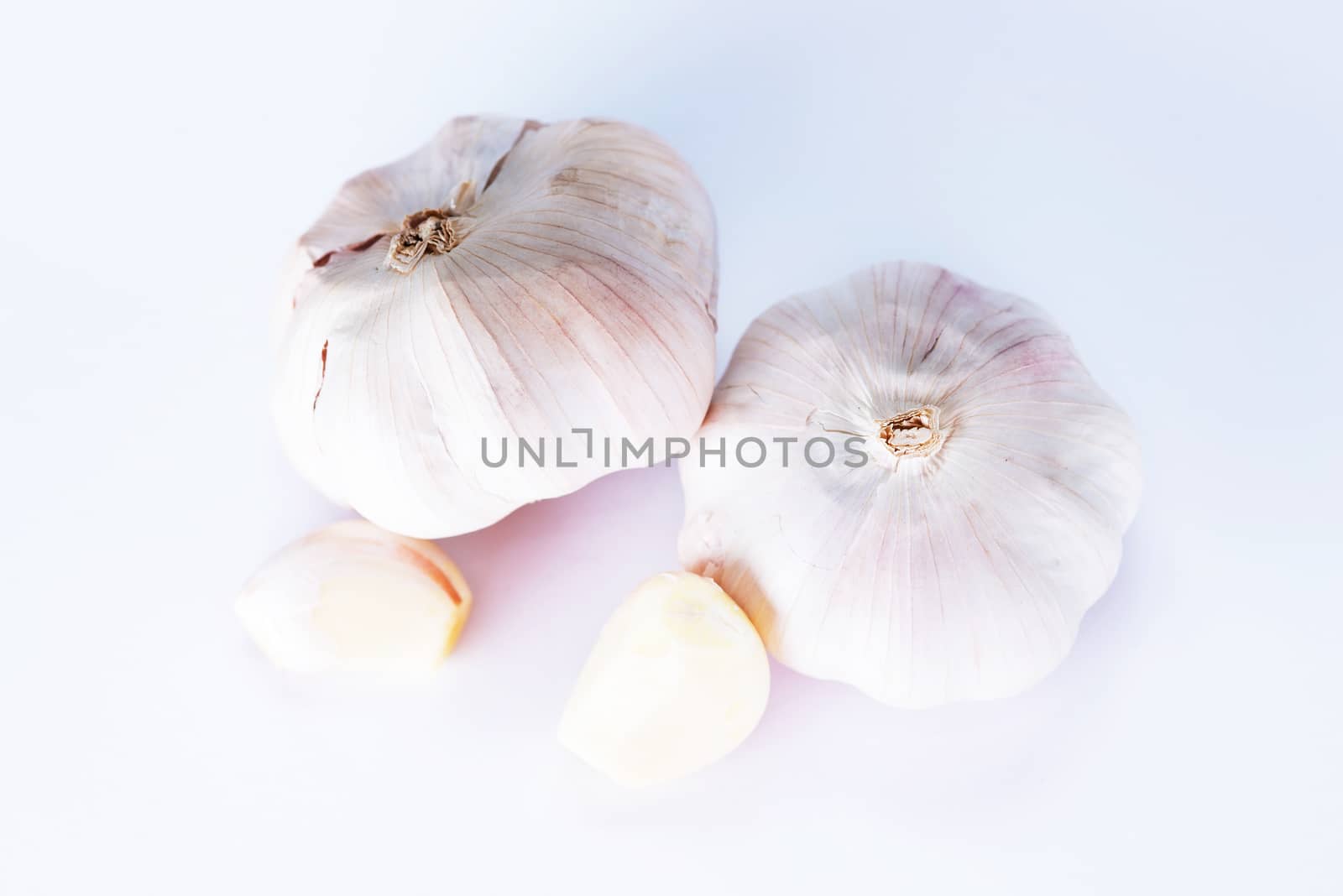 garlic isolated on white background by Yuri2012