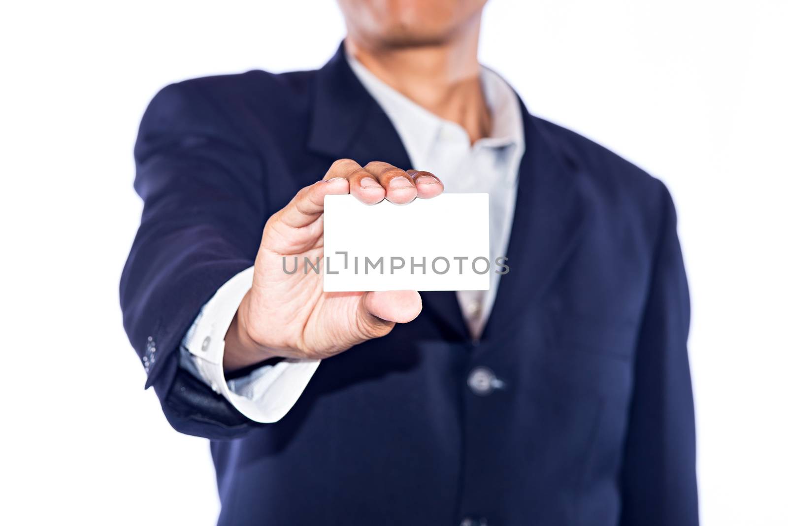 Man's hand showing business card - closeup shot on background