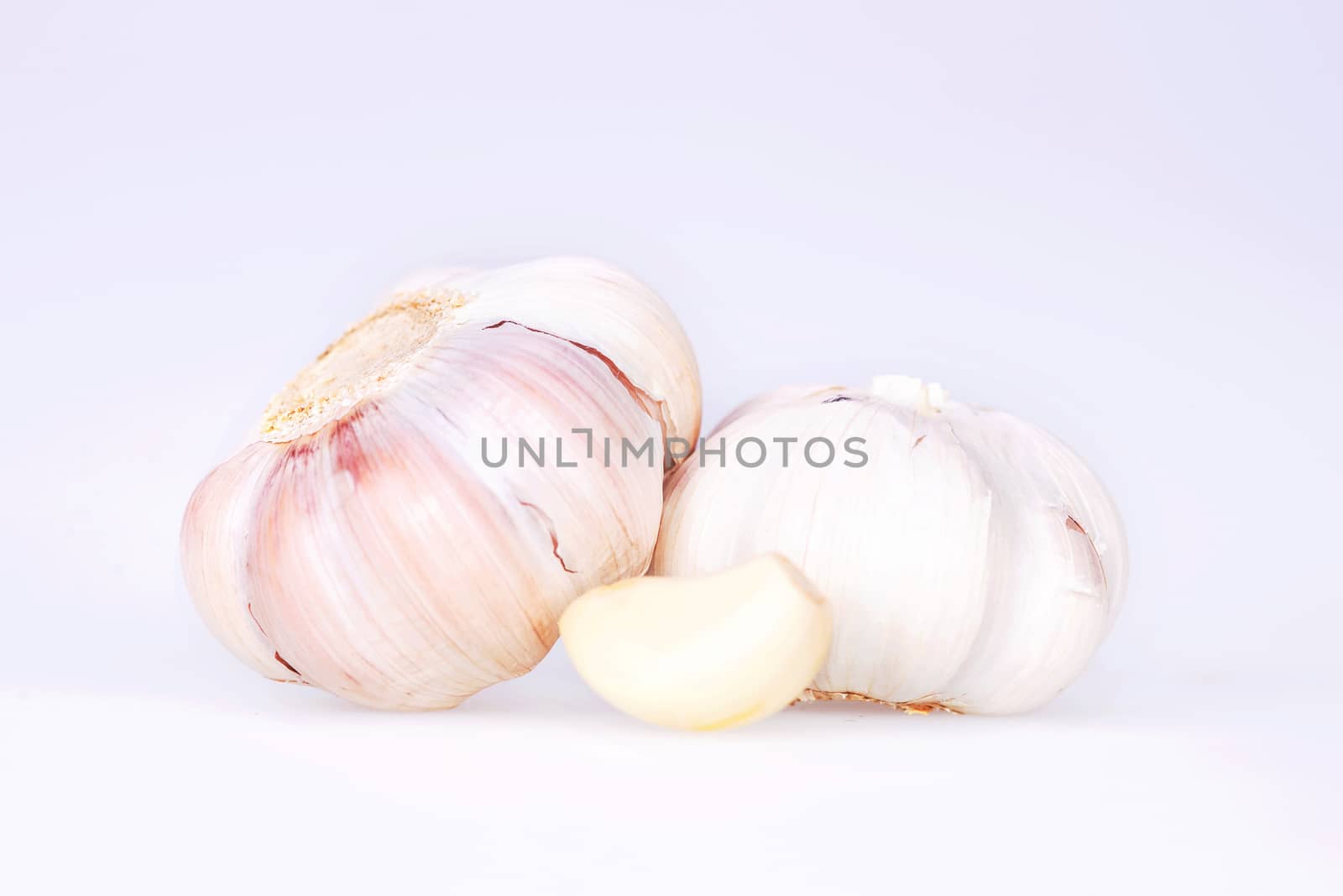 garlic isolated on white background by Yuri2012