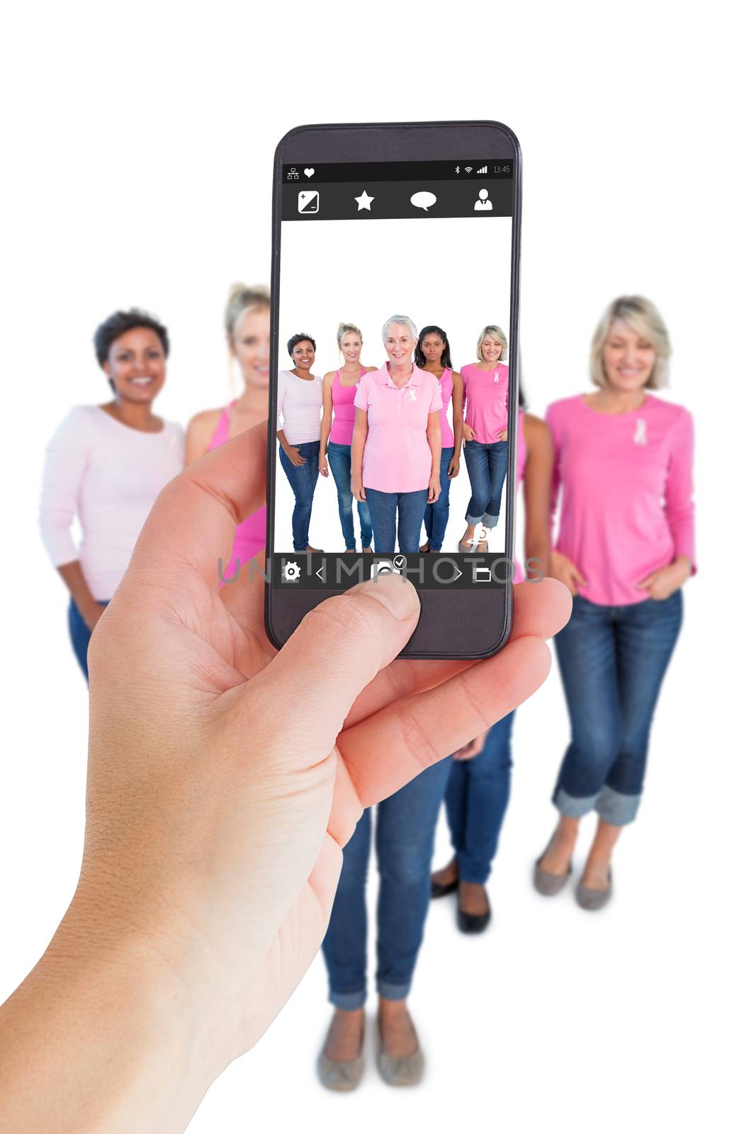 Female hand holding a smartphone against camera