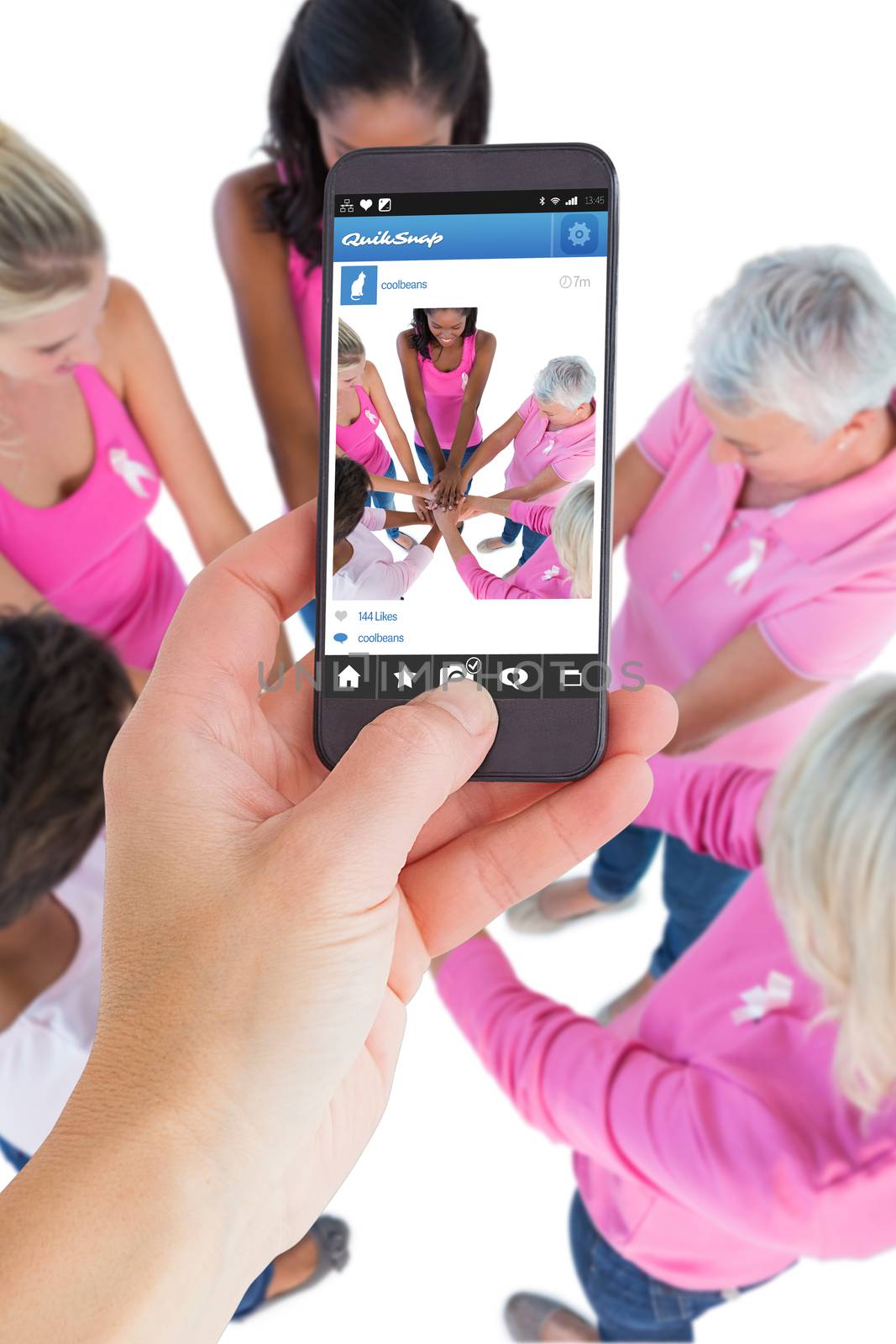 Female hand holding a smartphone against photo sharing app