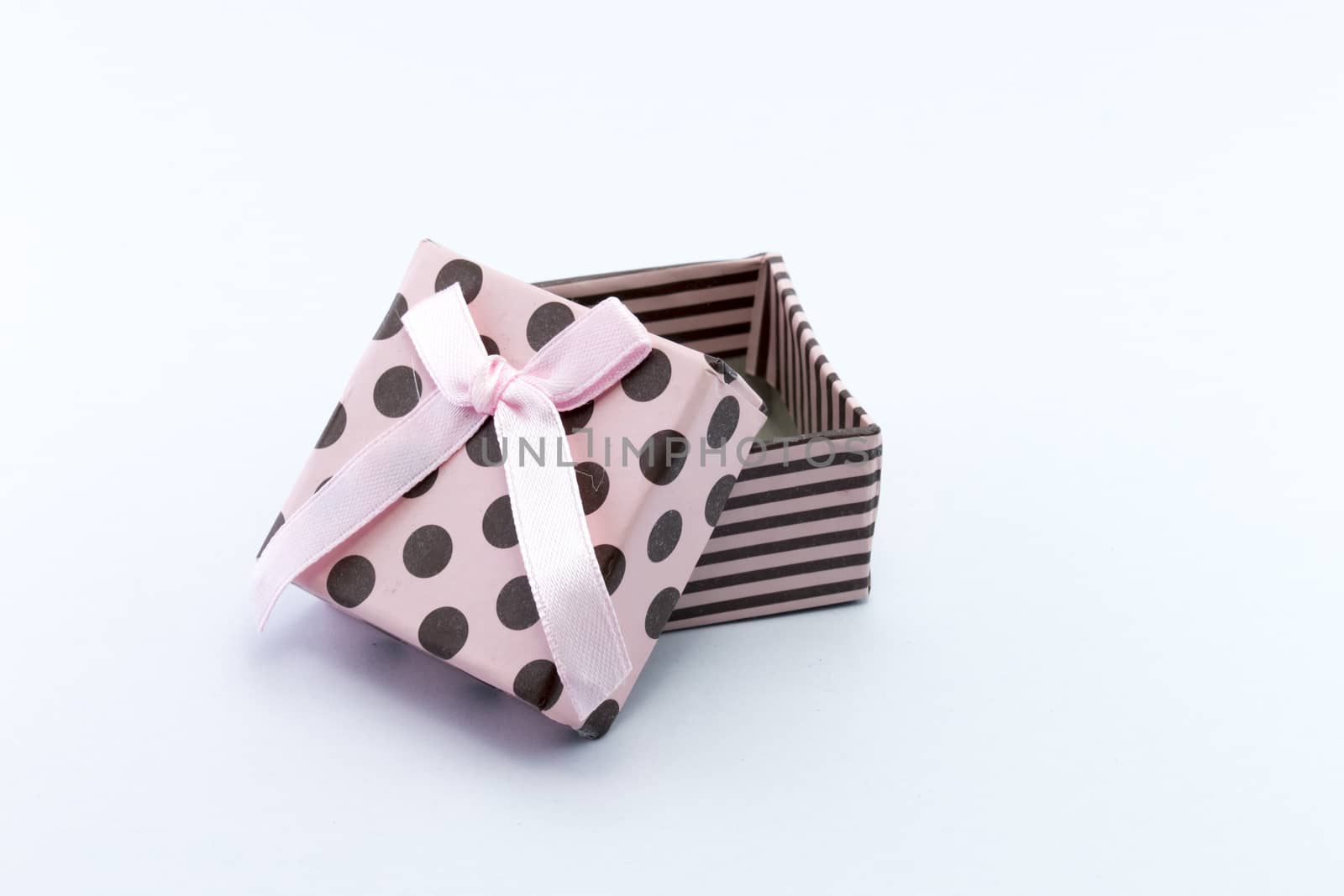 Pink gift box is opened isolated on white background., christmas gifts