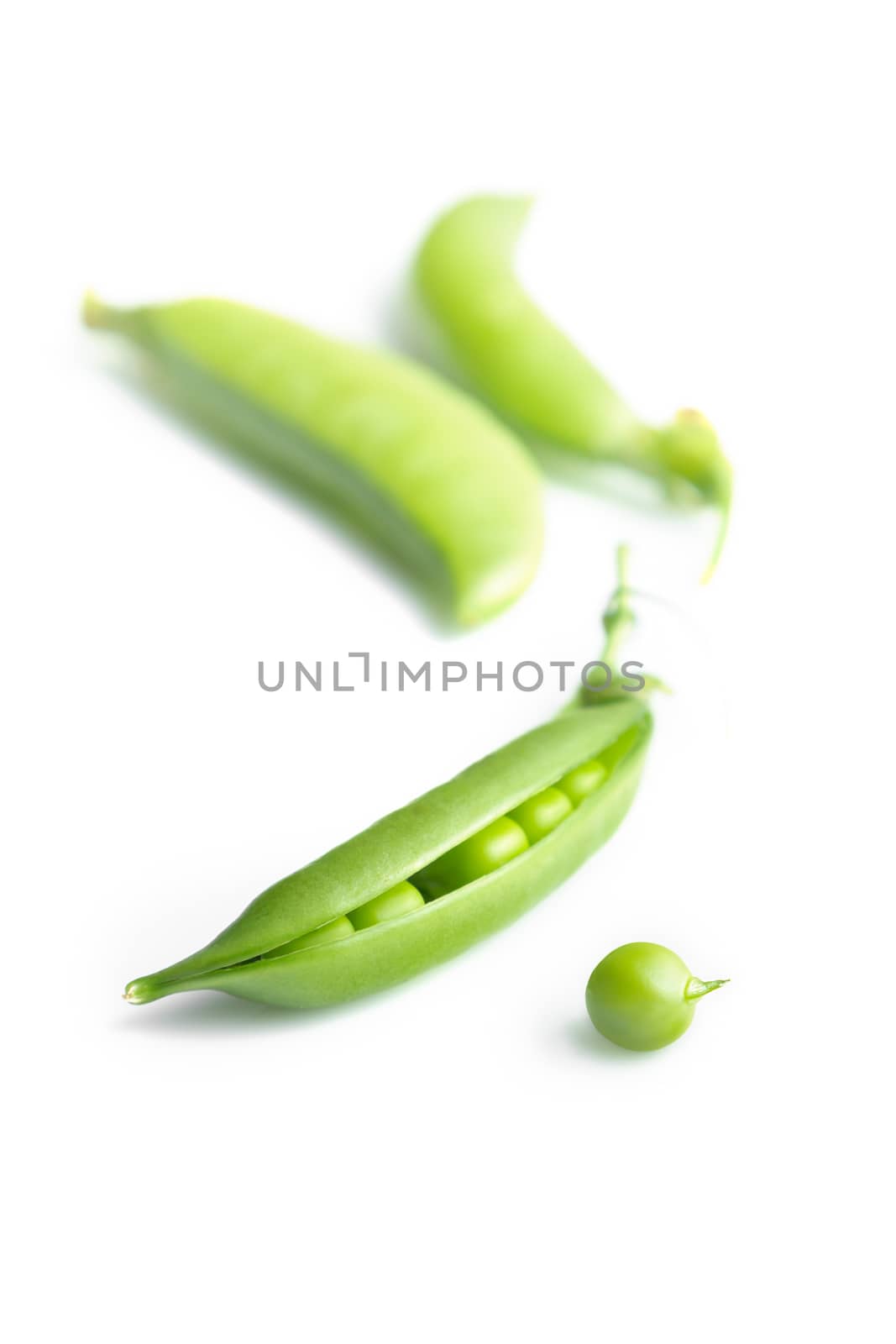 Fresh peas isolated on white background