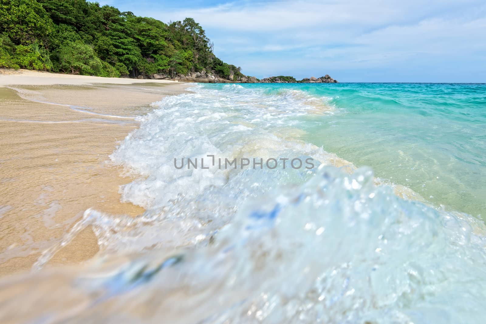 Beautiful landscape blue sea white sand and waves on the beach during summer at Koh Miang island in Mu Ko Similan National Park, Phang Nga province, Thailand