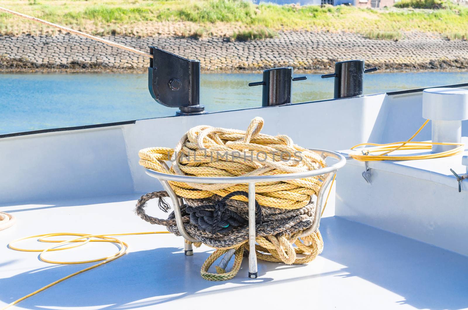 View of the front deck of a ship. In Focus cordage