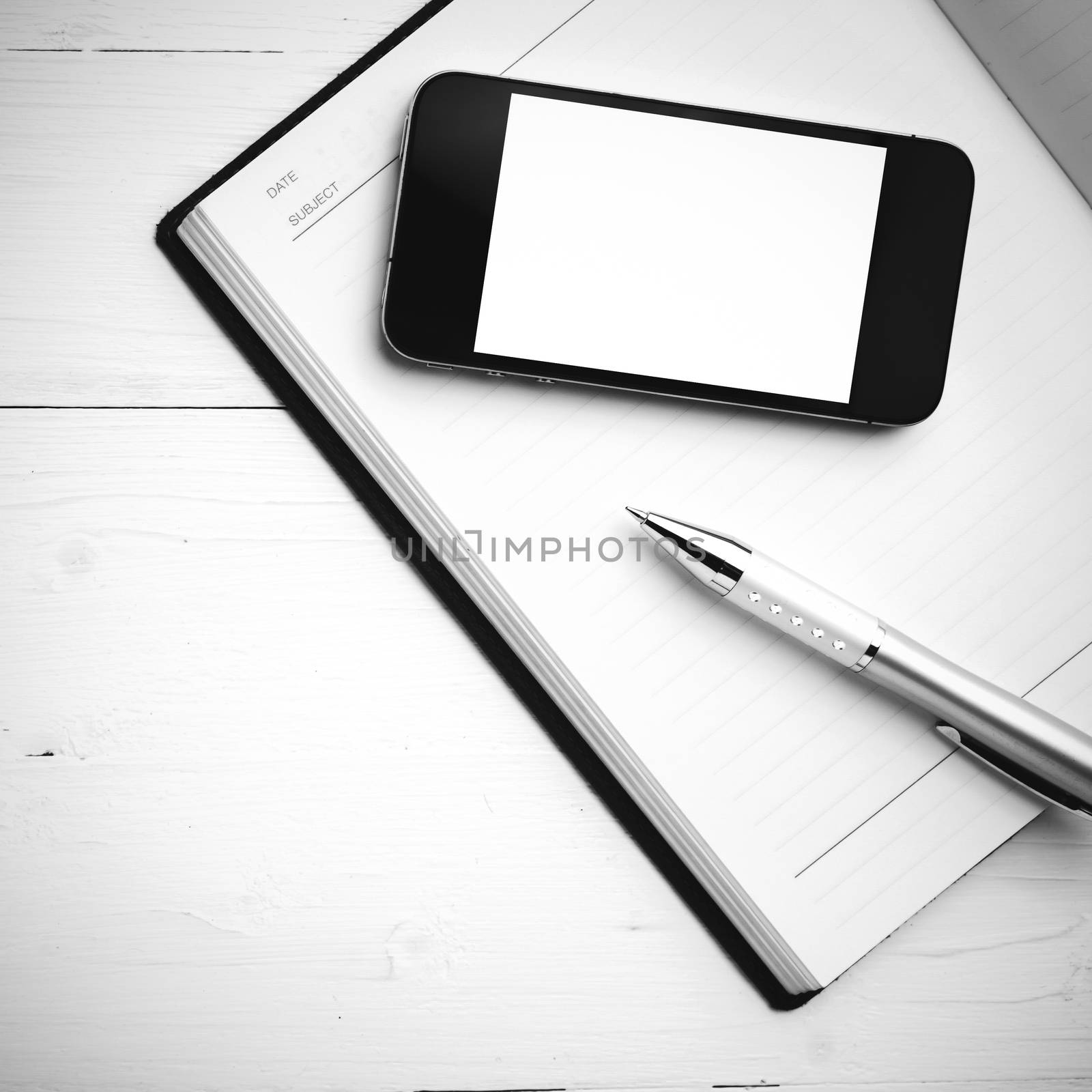 smart phone on notebook black and white style by ammza12