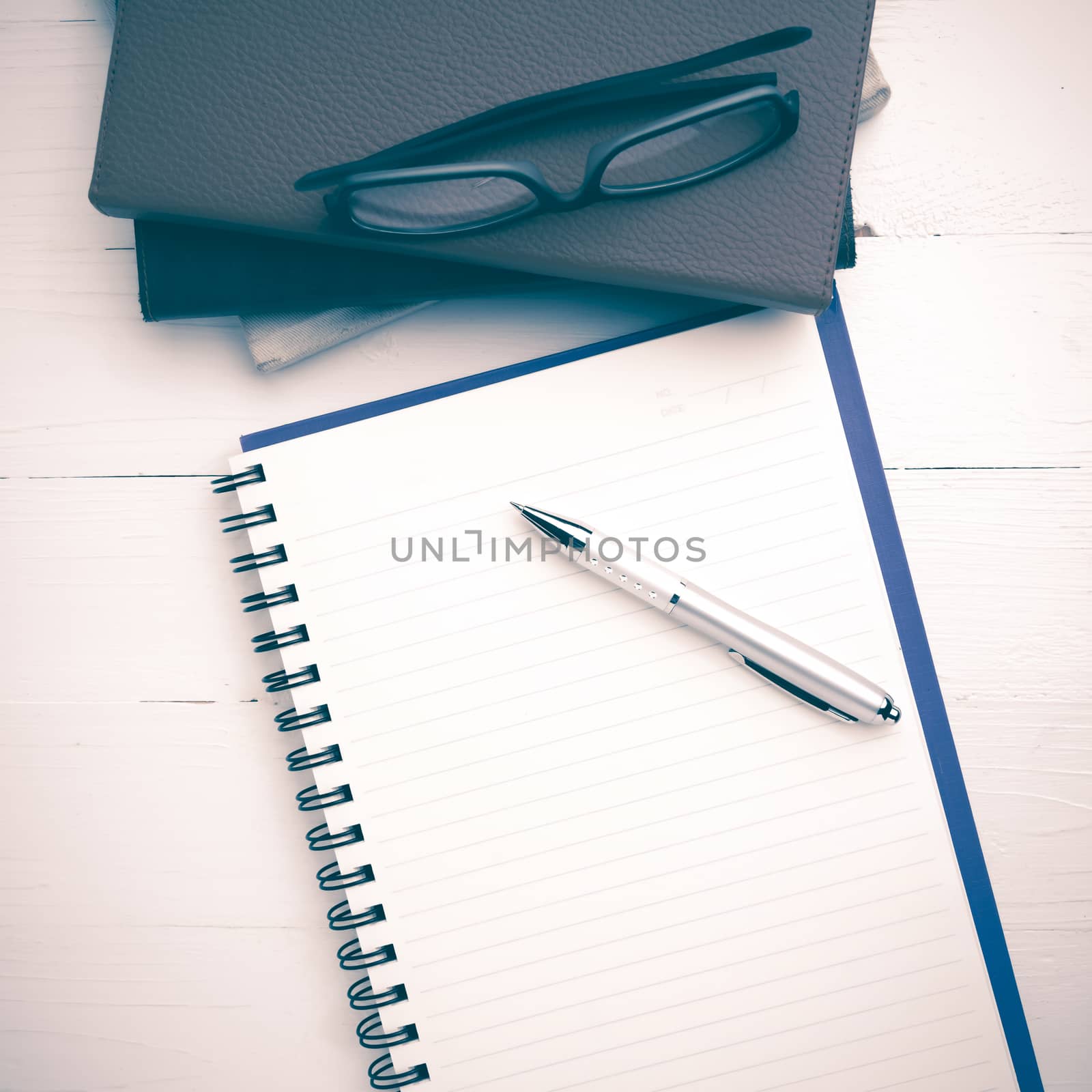 notepad with stack of book vintage style by ammza12