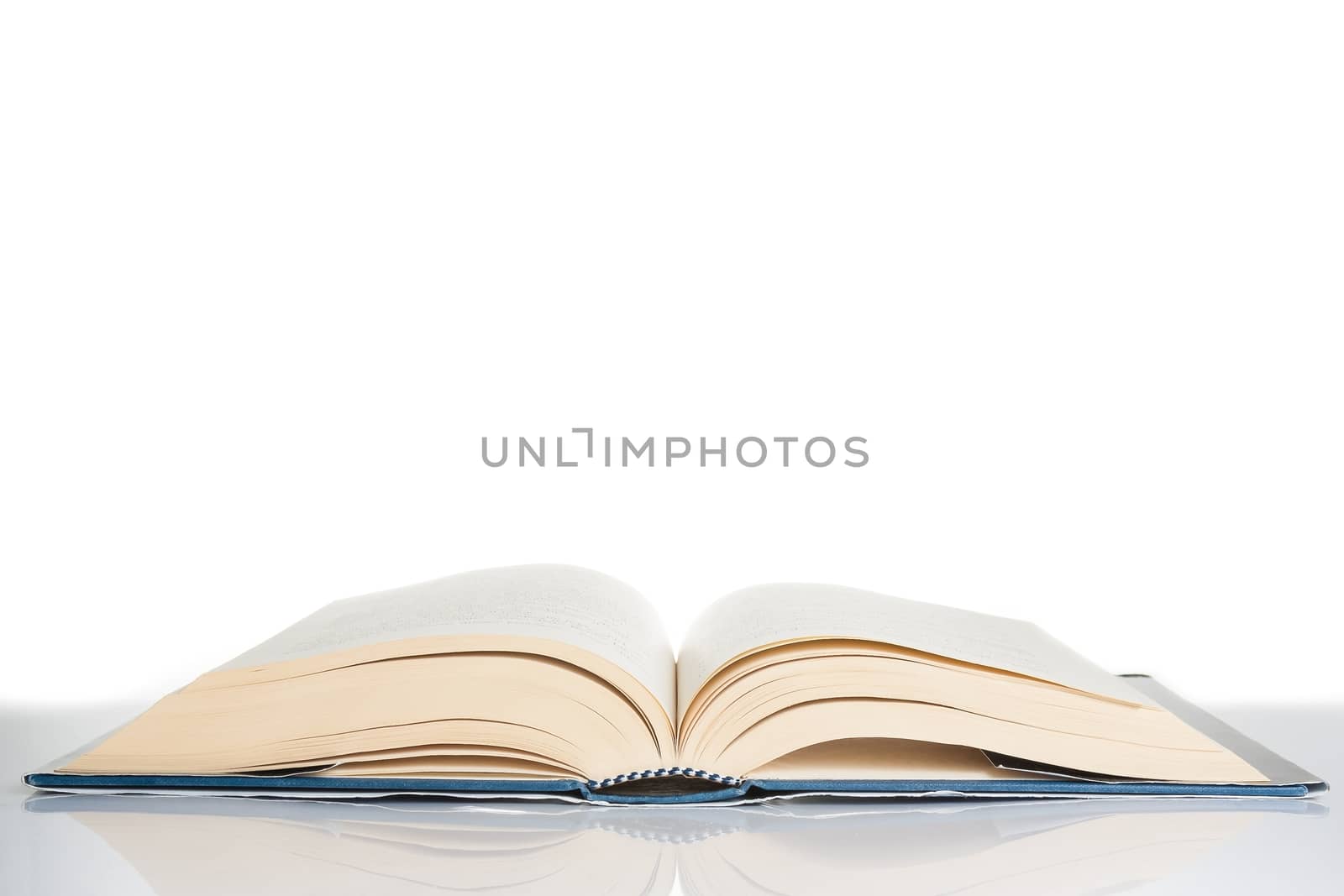 book isolated on table and white background with space for text, culture concept