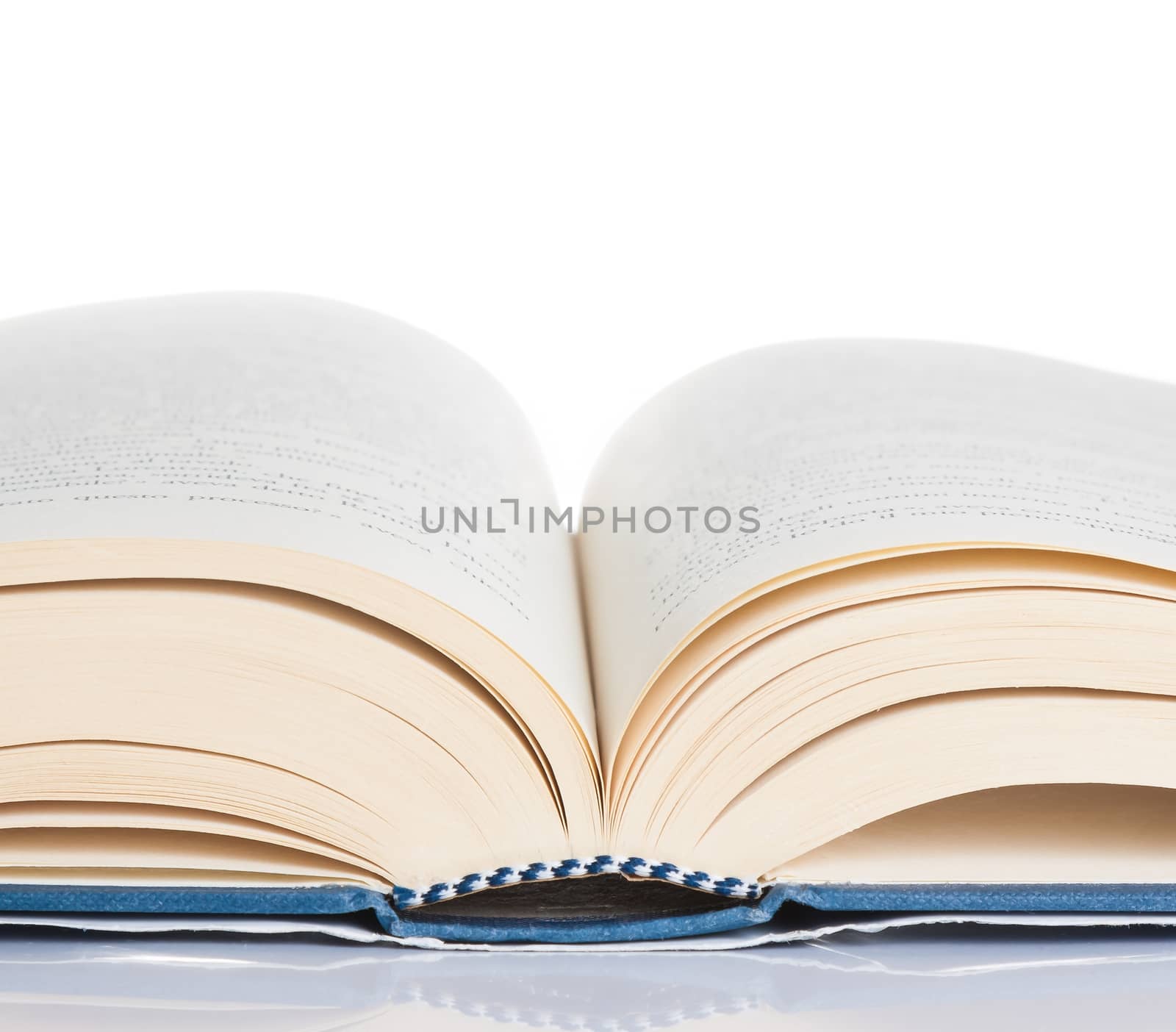 book opened on table and white background with space for text, culture concept