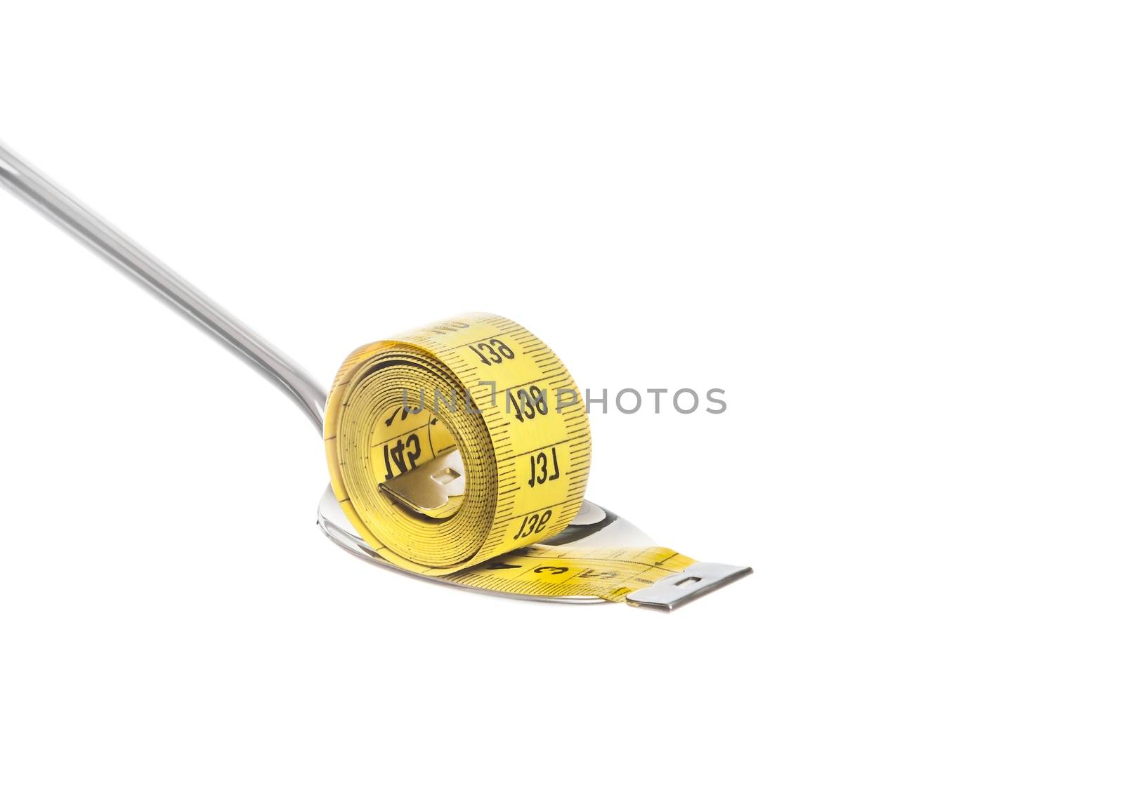 measuring tape on spoon, concept of nutrition and diet on white background with space for text
