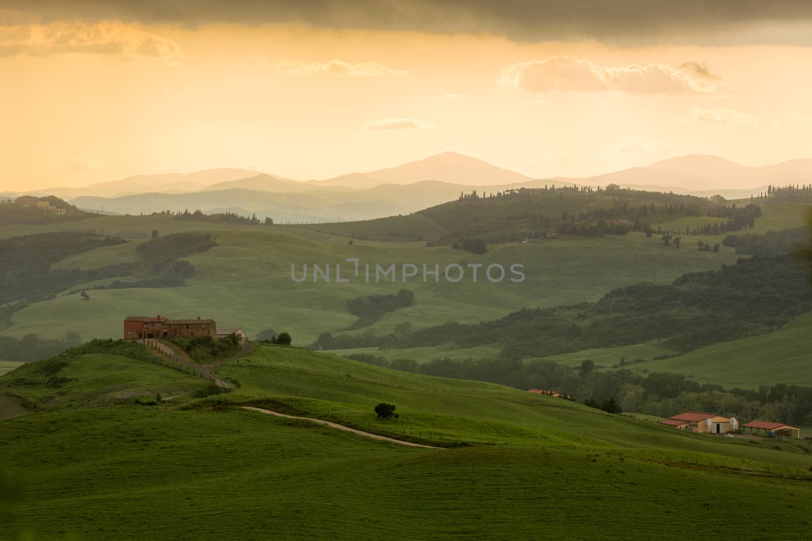 Tuscany landscape with farmhouse and yellow sky, Pienza, Italy by fisfra